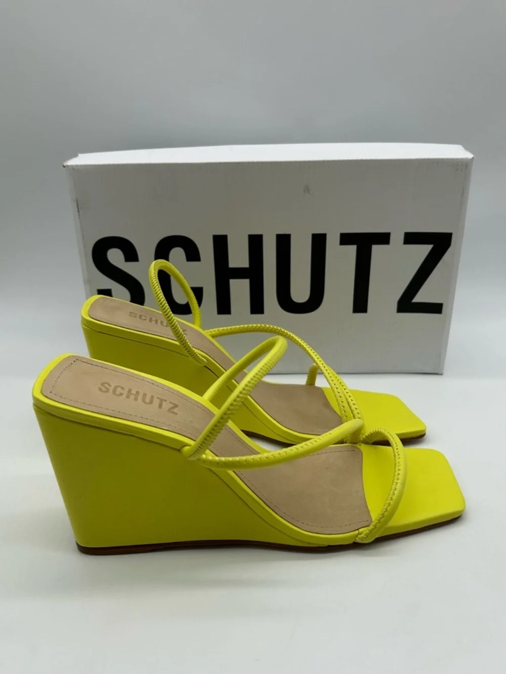 SCHUTZ item sandals display